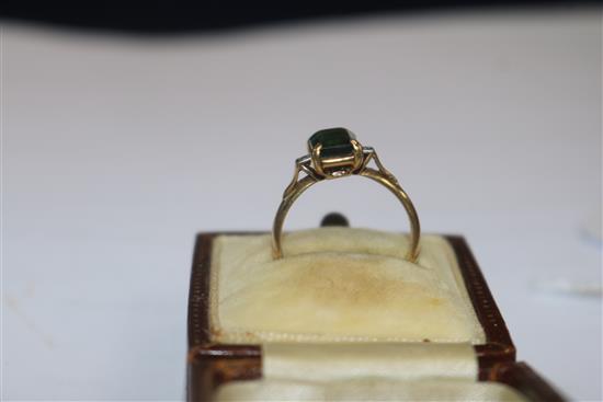 An 18ct gold and platinum, green tourmaline and diamond ring, size M.